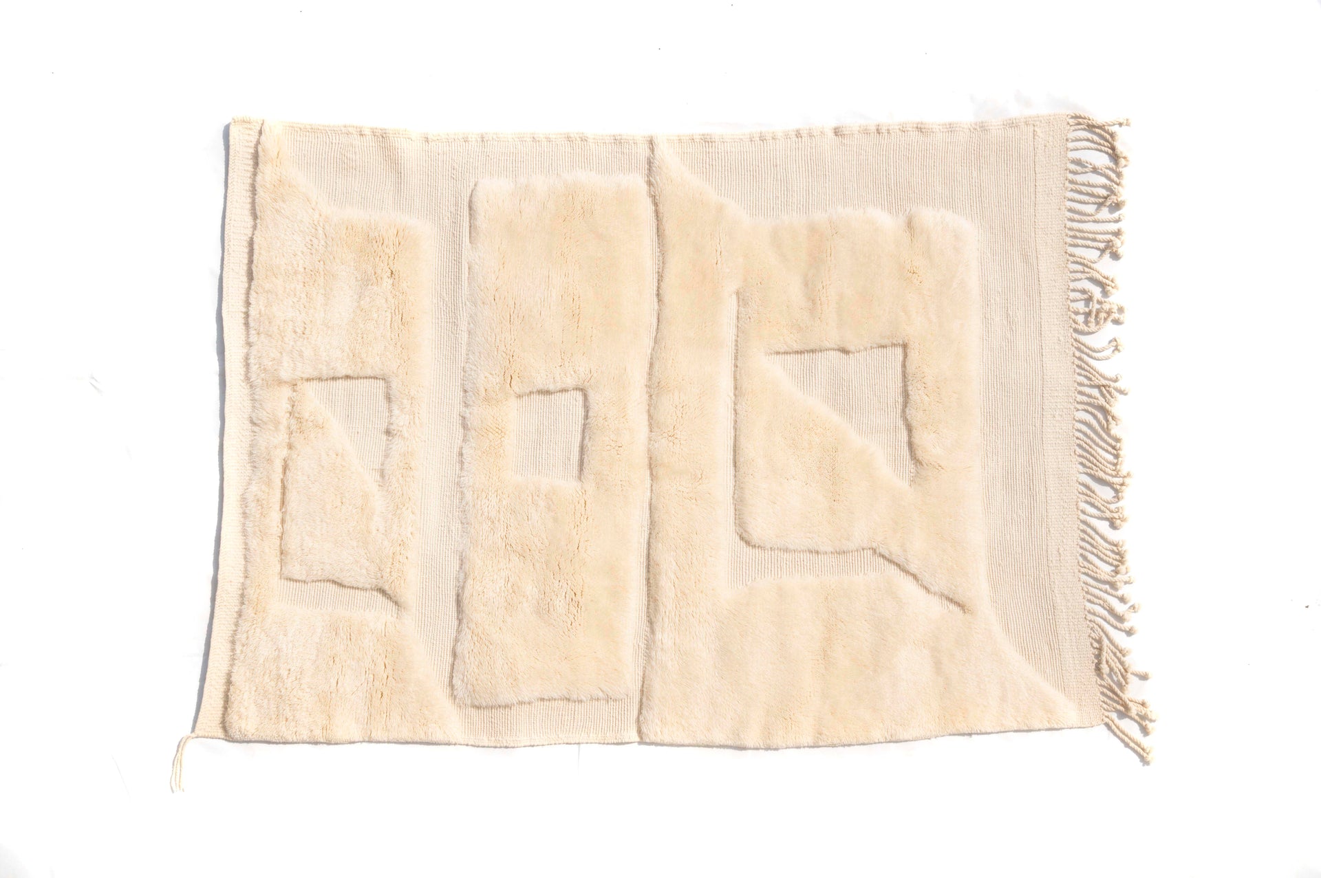 Soft Beige Geometric Plush Rug